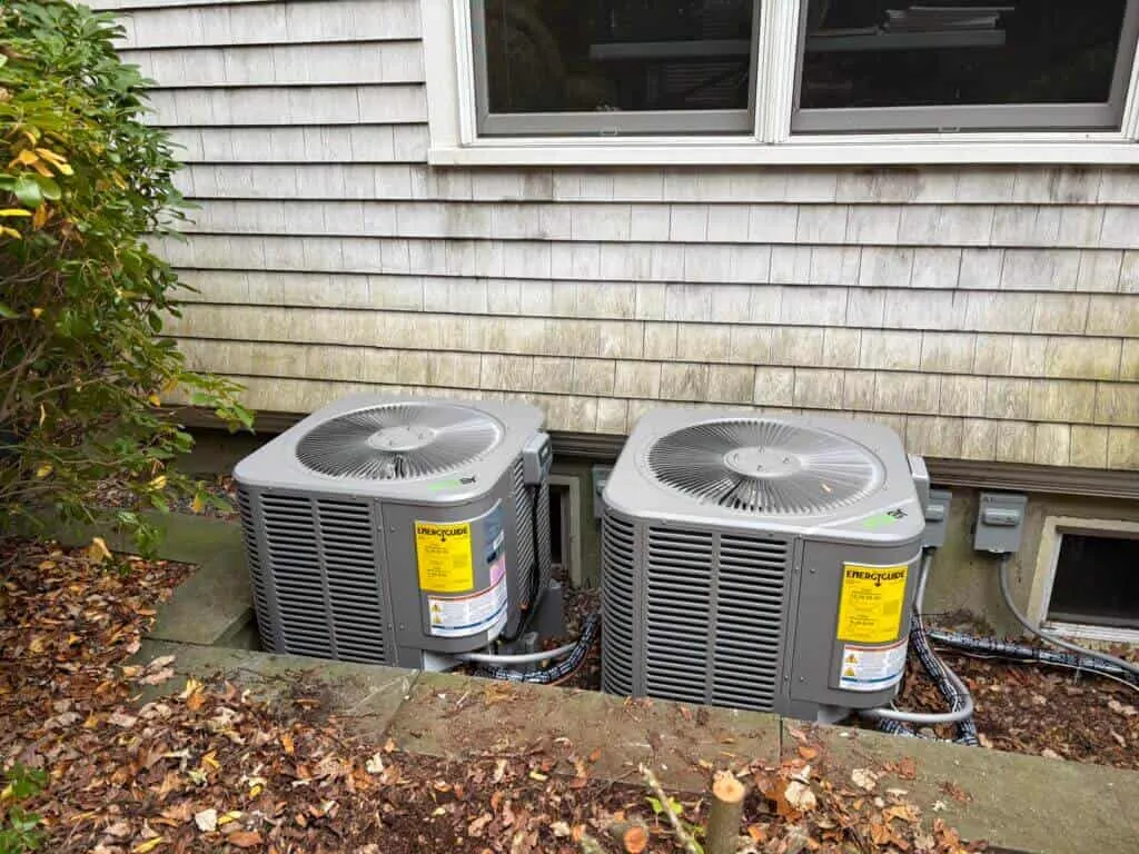 Riedell technicians completing a residential HVAC installation